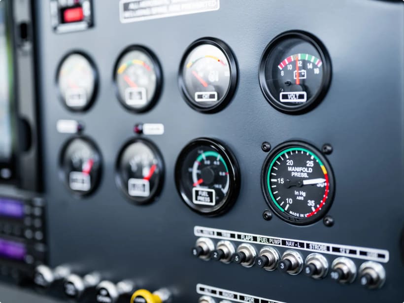 Cluster of round analog flight and engine gauges in a Bristell instrument panel.