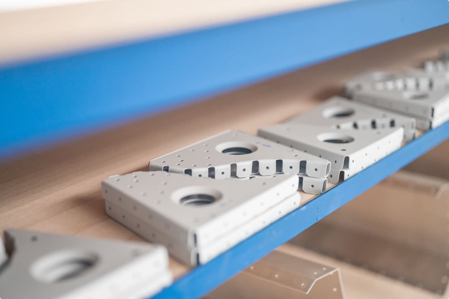 Machined aluminium airframe brackets staged for the next production step