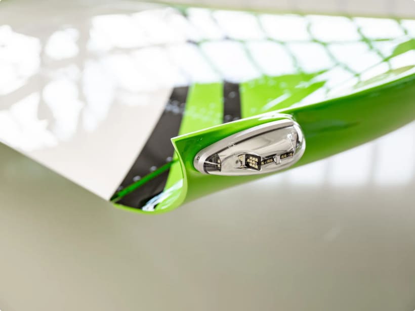 Green wingtip navigation light and strobe on a Bristell wing.